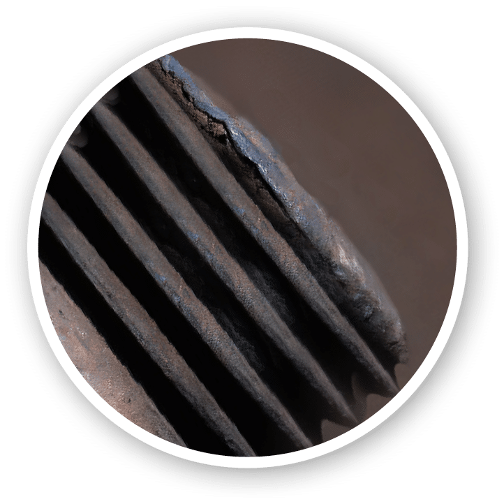 Old rusty bolts with nuts and washers on concrete sleepers on rail. Macro.