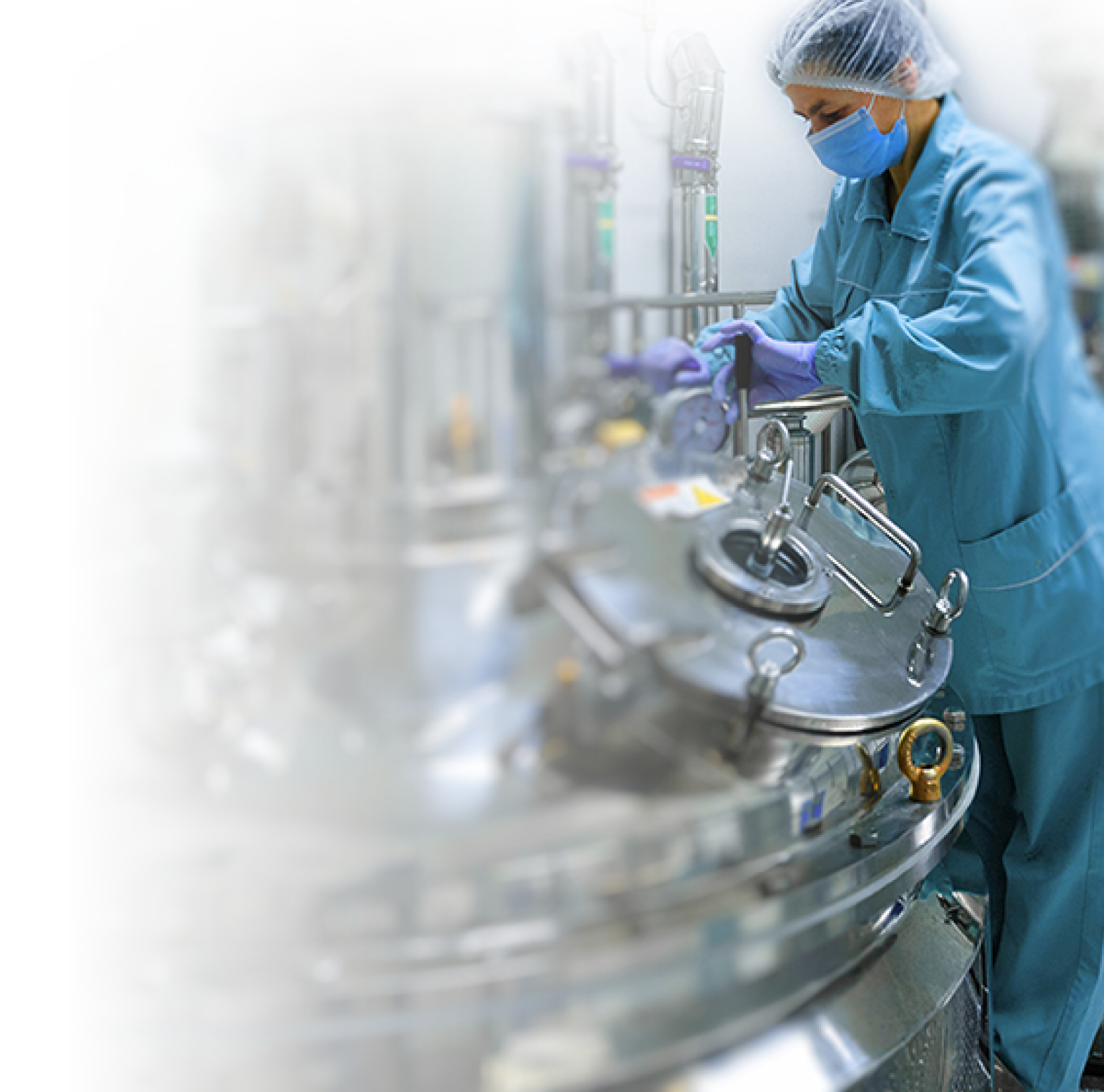Pharmaceutical technician in sterile environment at pharmacy industry