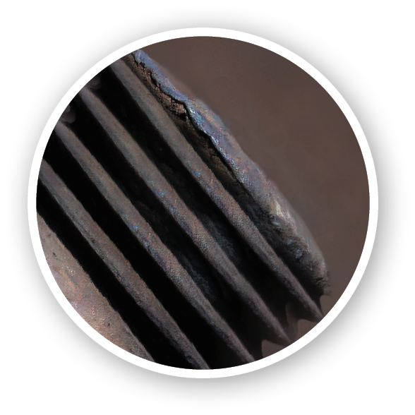 Old rusty bolts with nuts and washers on concrete sleepers on rail. Macro.