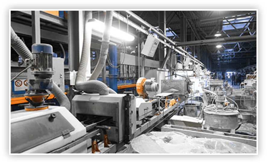 Concrete mixing tank of the factory. Dusty machines and other tools for sand and concrete processing and production