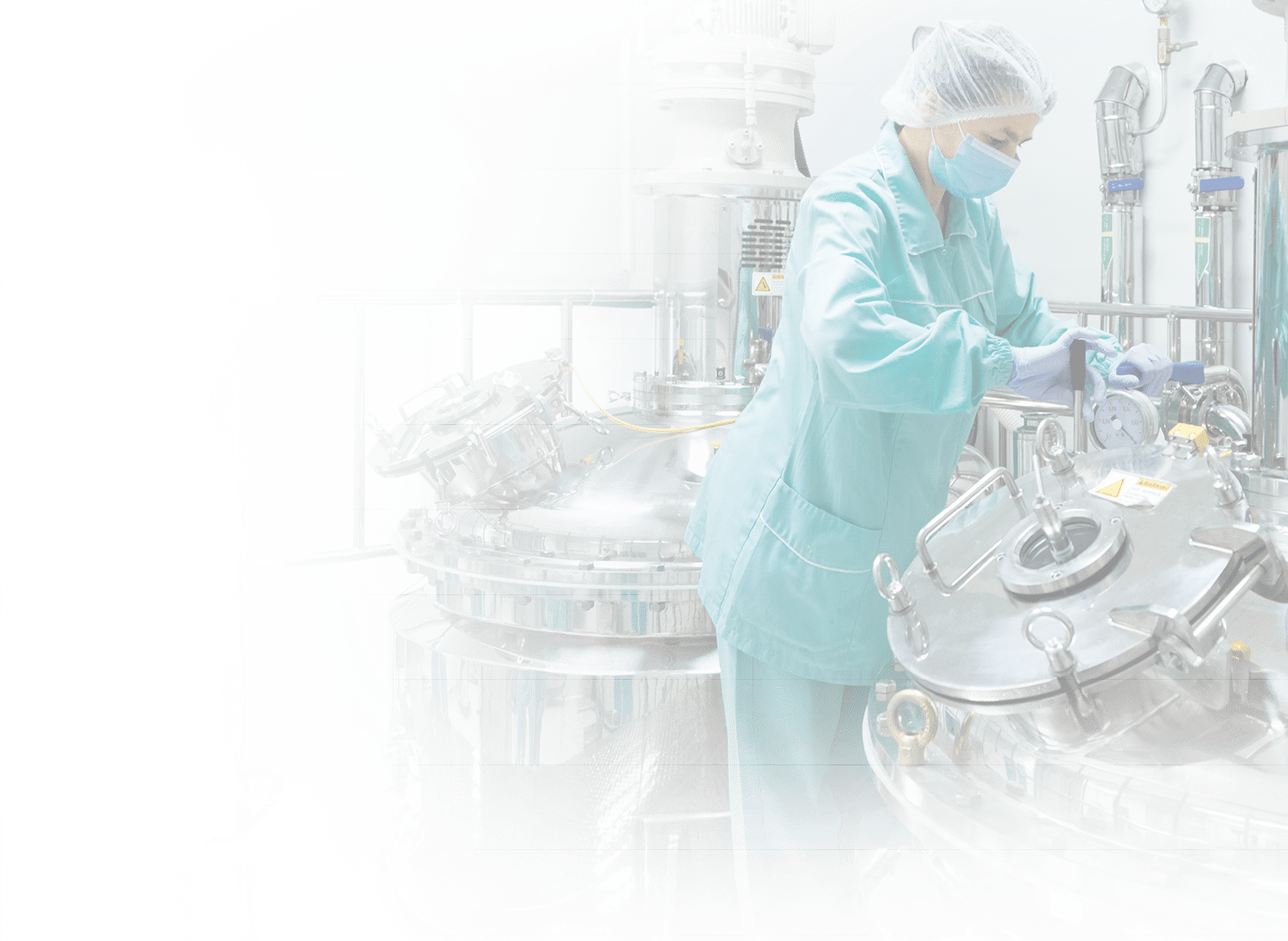 Pharmaceutical technician in sterile environment at pharmacy industry